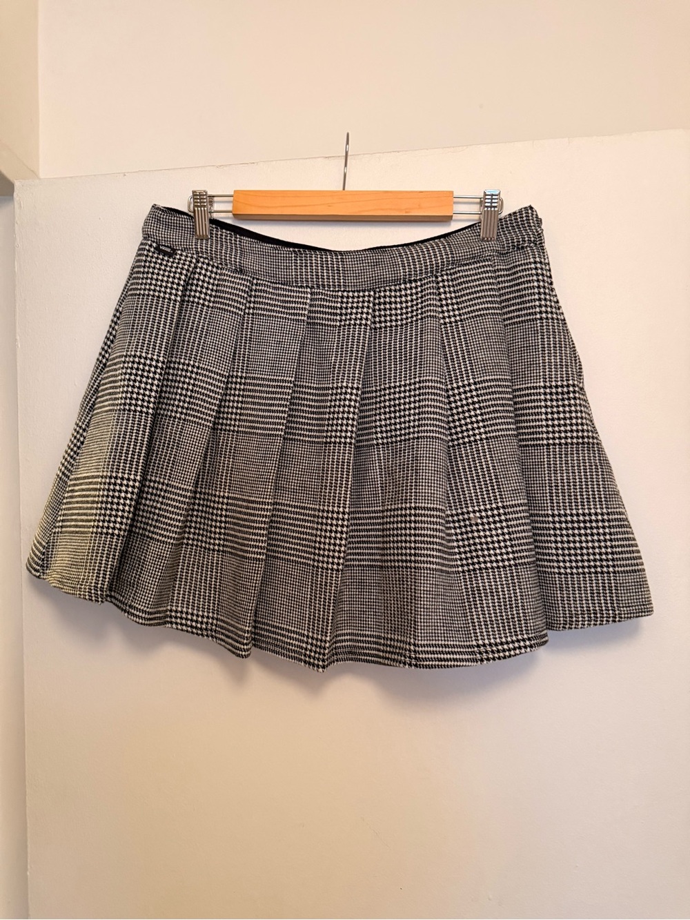 Pleated black & white plaid mini skirt from Vans is brand new.